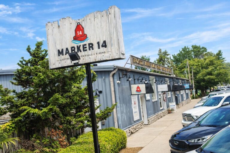 From Mermaid to Marker 14: historic boat warehouse reopens as riverfront restaurant & cocktail bar (Saugatuck, MI)